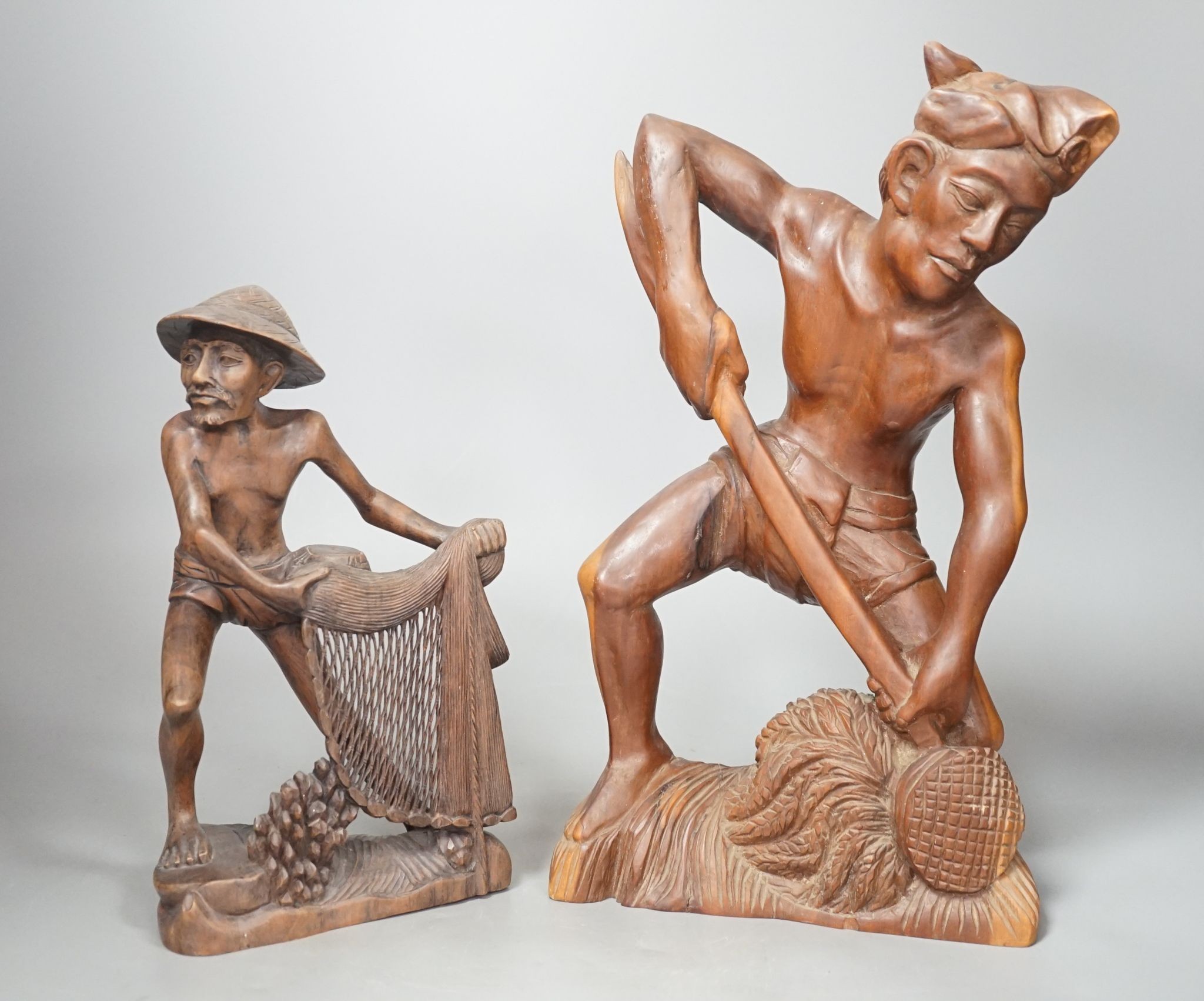 Two southeast Asian figural hardwood carvings 35cm